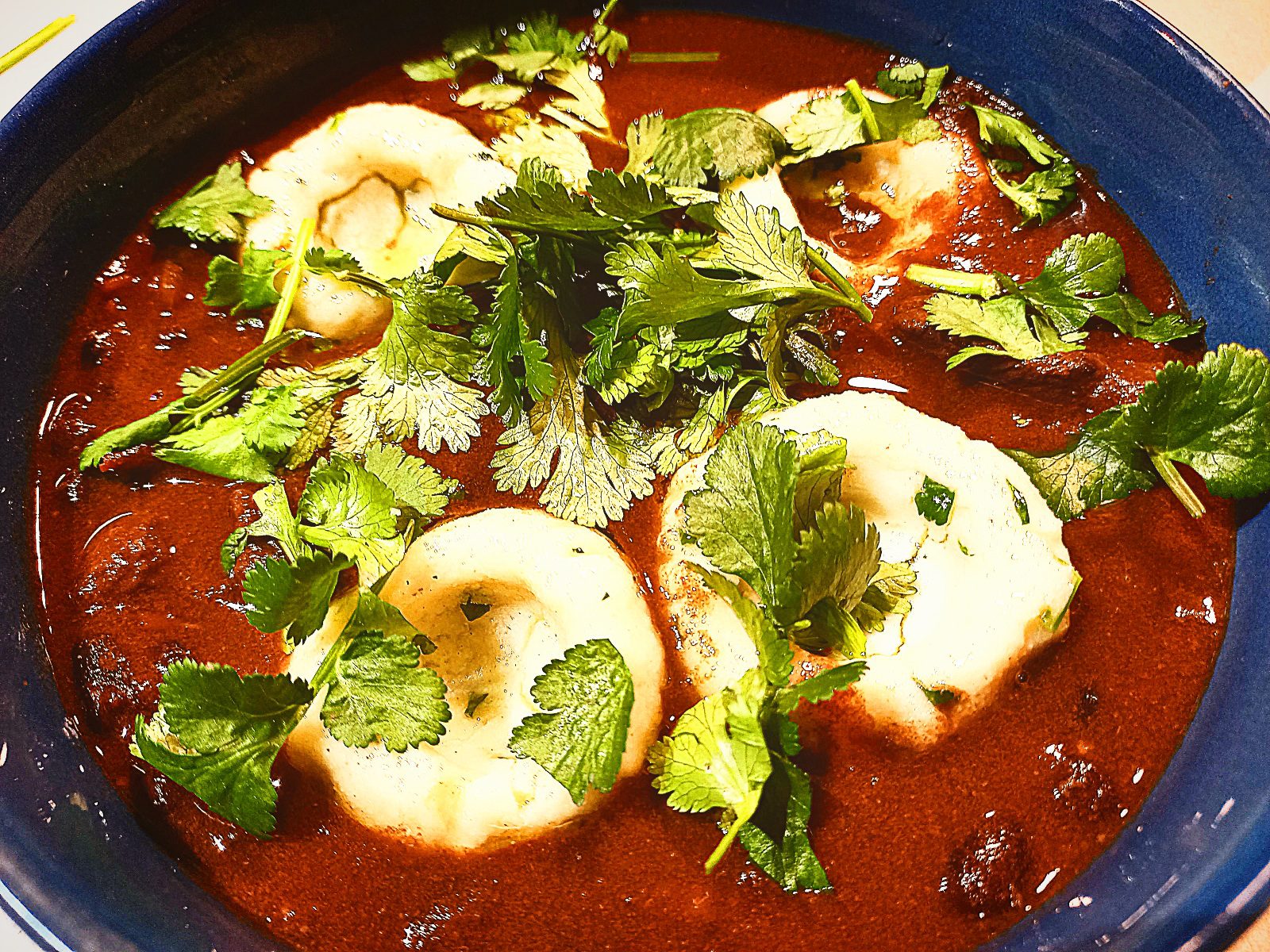 Venison, black bean chilli topped with 4 mexican dumplings and chopped coriander