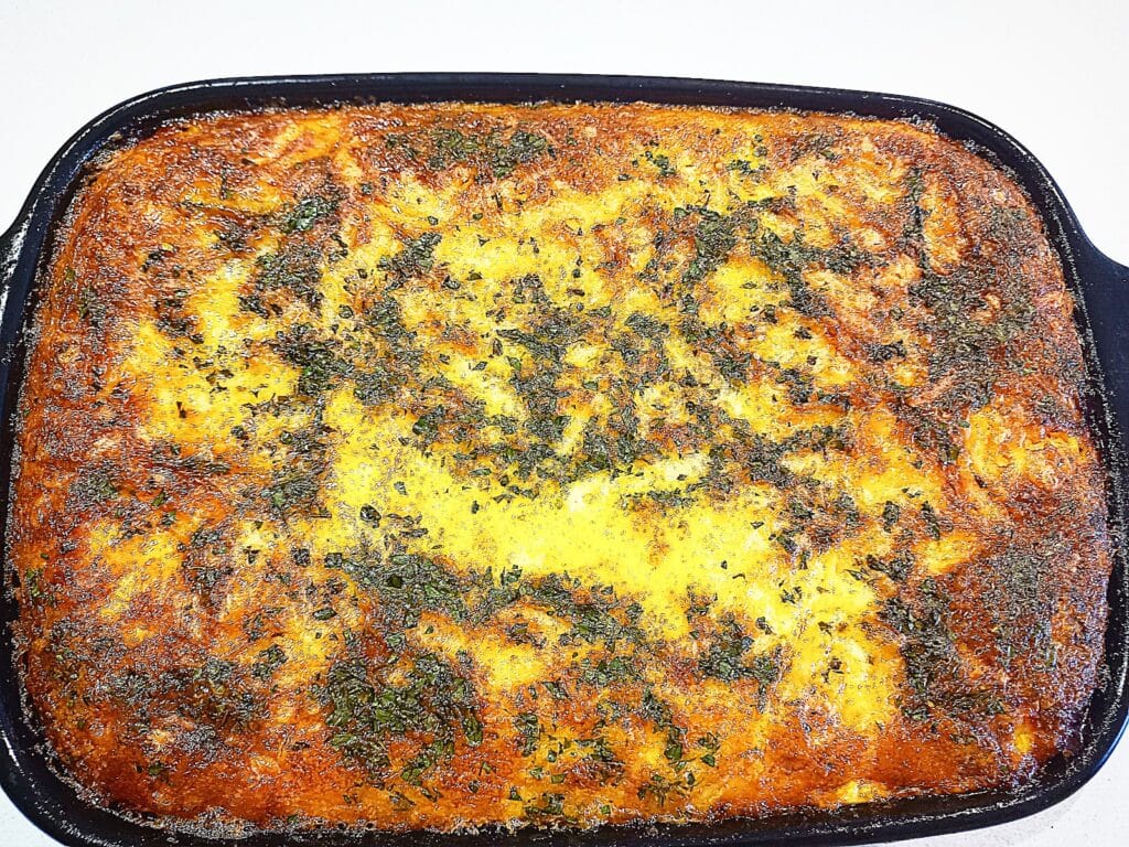 Lamb and courgette bake cooked golden brown
