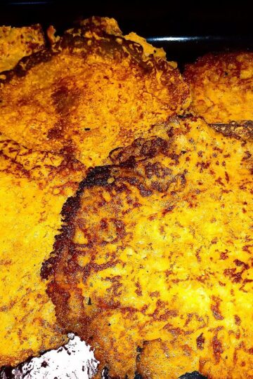 6 Raggmunkar on a black oven tray