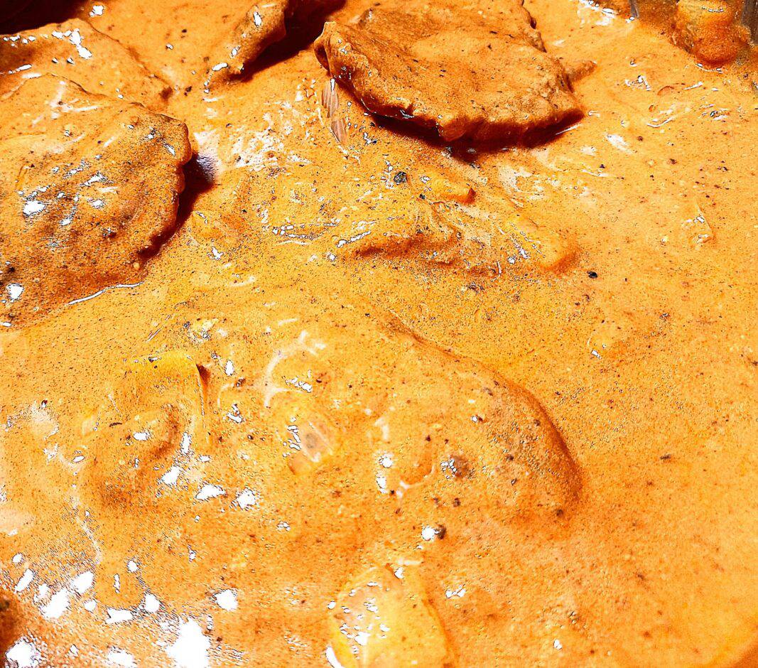 Wild pork pepper steak in a creamy tomato sauce